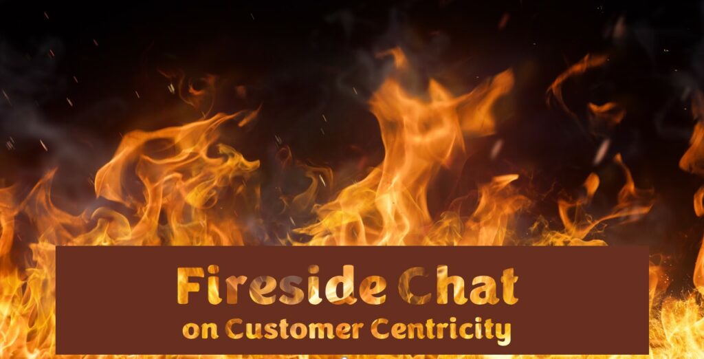 Flames fill the background with the text "Fireside Chat on Customer Centricity" displayed in bold letters across the lower part of the image.